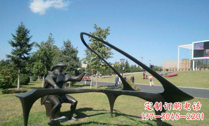 信阳抽象人物弹钢琴铜雕