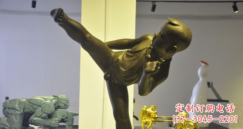 信阳领雕塑男孩练功夫铜雕