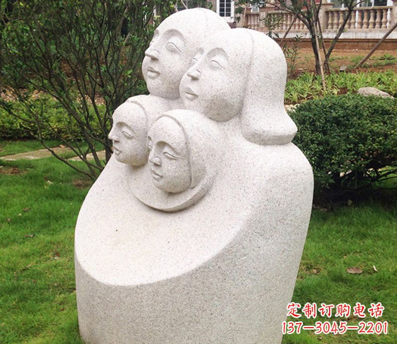 信阳公园母子人头像石雕