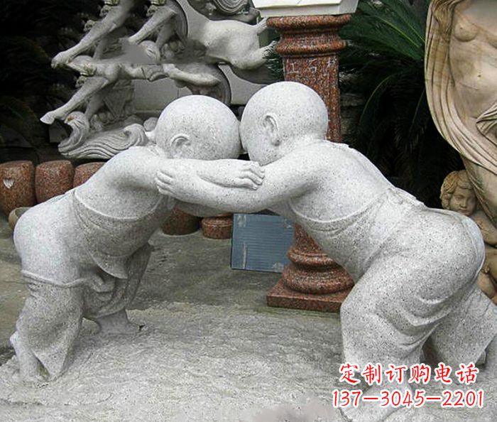 信阳可爱小孩摔跤石雕