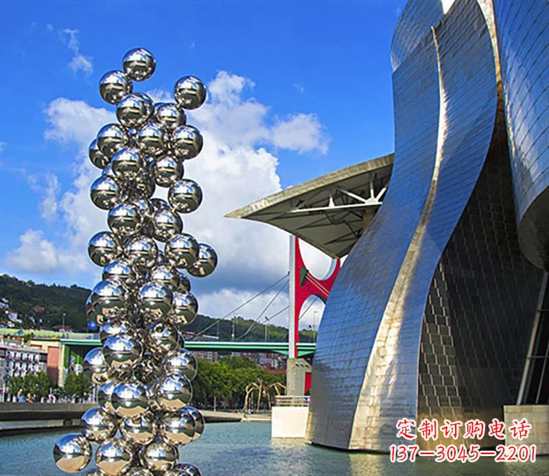 信阳高端不锈钢抽象龙柱雕塑