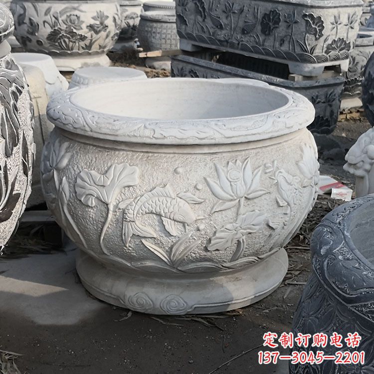 信阳中领雕塑汉白玉石鱼缸雕塑,是一种精美的装…