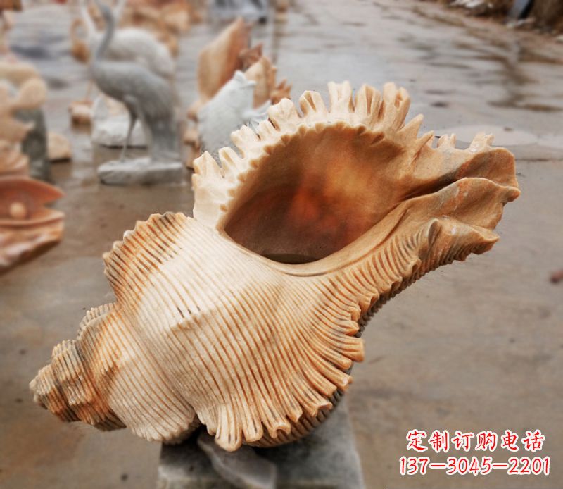 信阳晚霞红海螺石雕广场景观雕塑