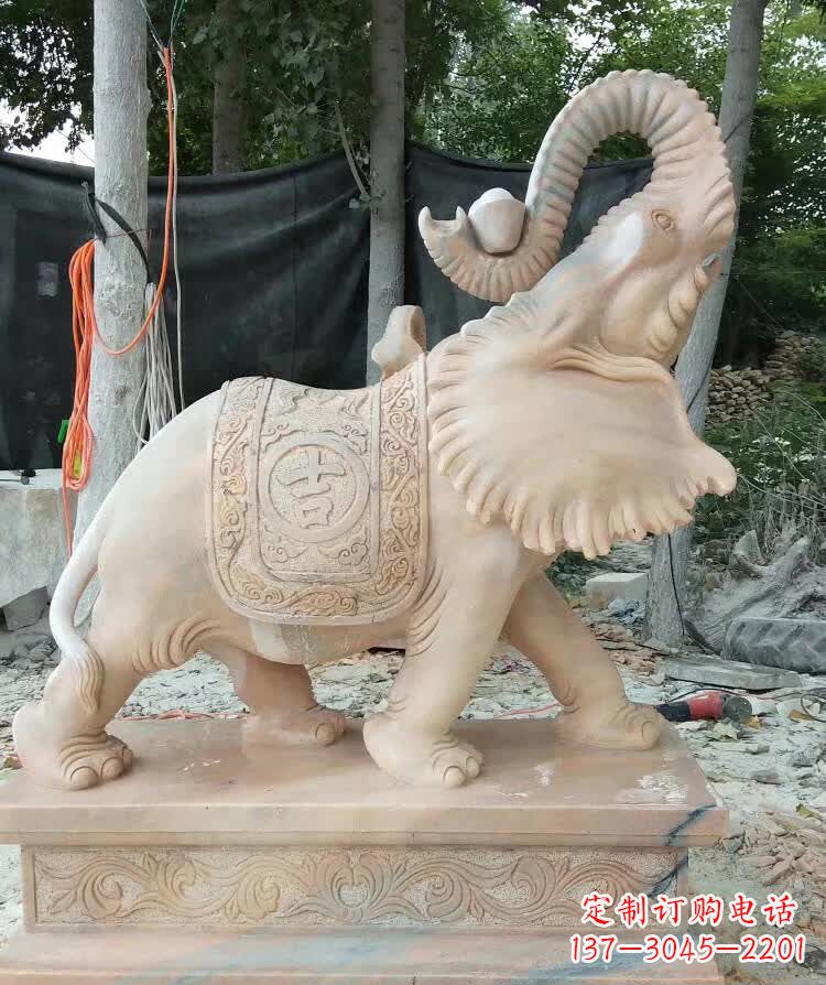 信阳晚霞红卷元宝大象雕塑