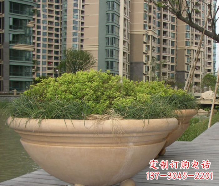 信阳小区景观晚霞红花盆石雕