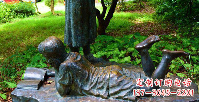 信阳校园趴着看书的小男孩人物铜雕