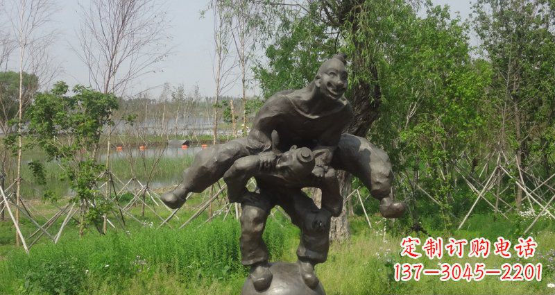 信阳园林站在球上面跳山羊的人物景观铜雕