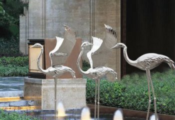 信阳鹤雕塑-公园不锈钢镜面喷泉中的鹤雕塑